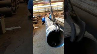 Processo de manuseio de tubos galvanizados de grande porte